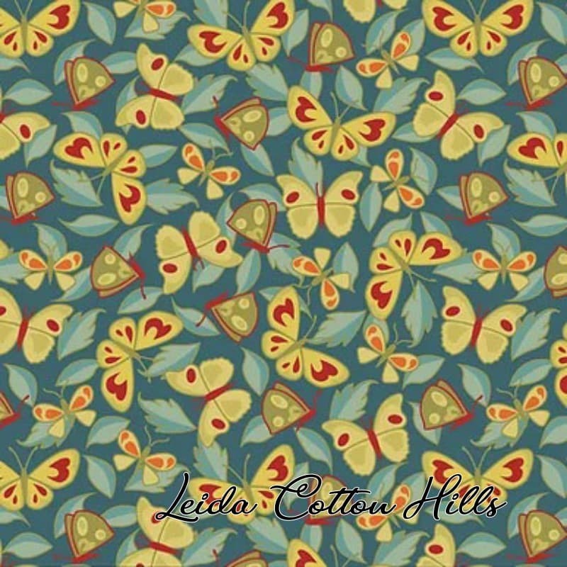 Tela para patchwork con mariposas sobre turquesa ∙ Leida Cotton Hills