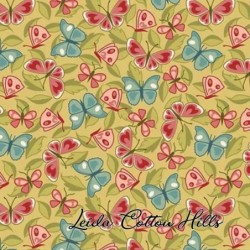 Tela para patchwork con mariposas sobre color pera ∙ Leida Cotton Hills