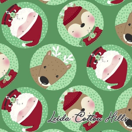 Tela para patchwork con círculos con caras de renos y Papá Noel ∙ Leida Cotton Hills