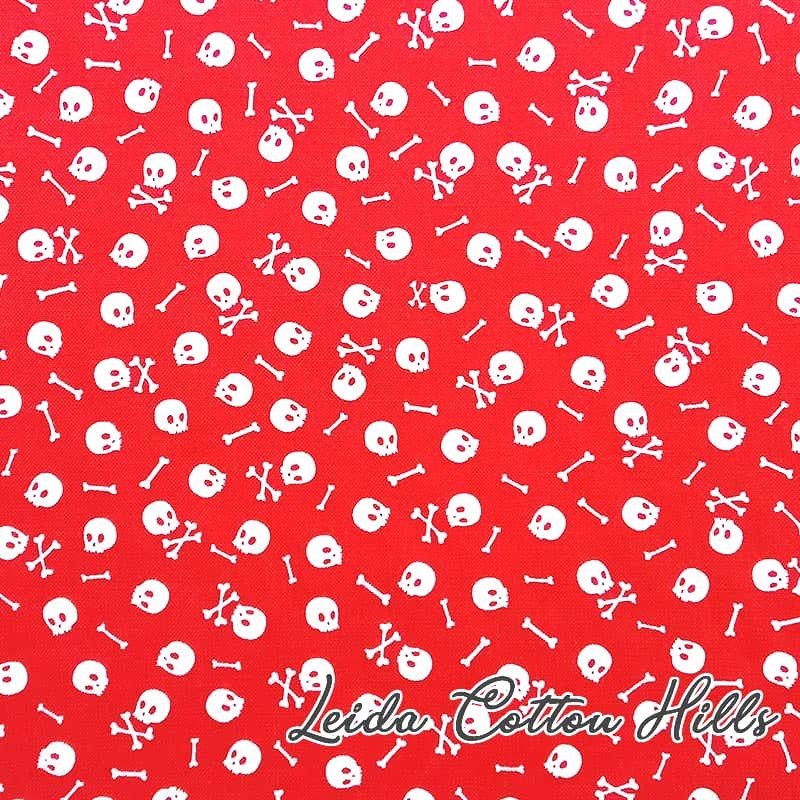 Tela para patchwork con calaveras sobre rojo ∙ Leida Cotton Hills