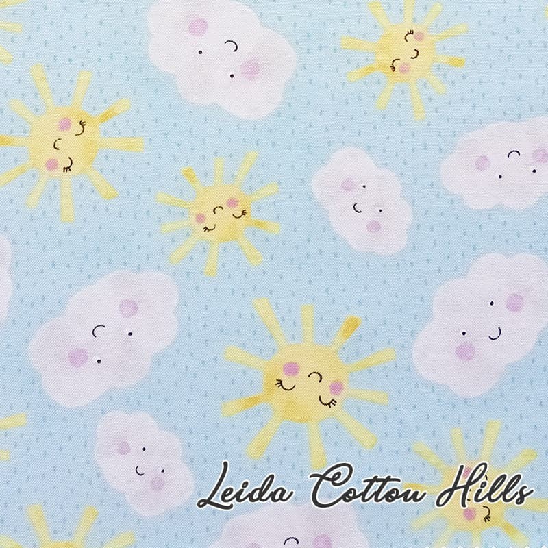 Tela para patchwork con soles y nubes ∙ Leida Cotton Hills