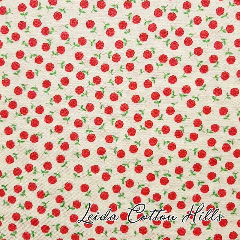 Tela para patchwork con florecitas rojas