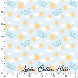 Tela para patchwork con soles y nubes