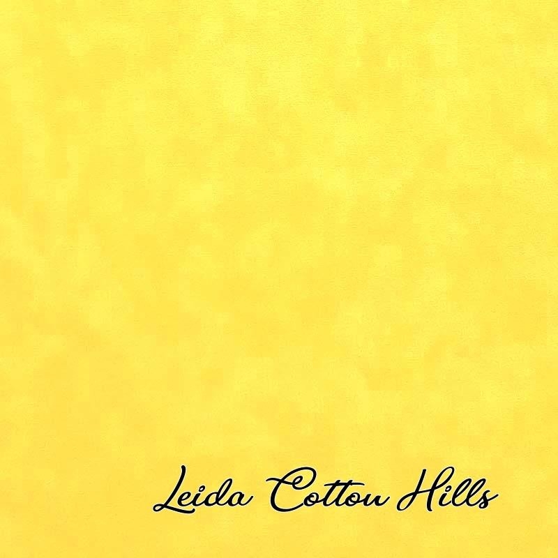 Tela trasera para patchwork tono sobre tono con estampado marmoleado en tonos amarillos ∙ Leida Cotton Hills